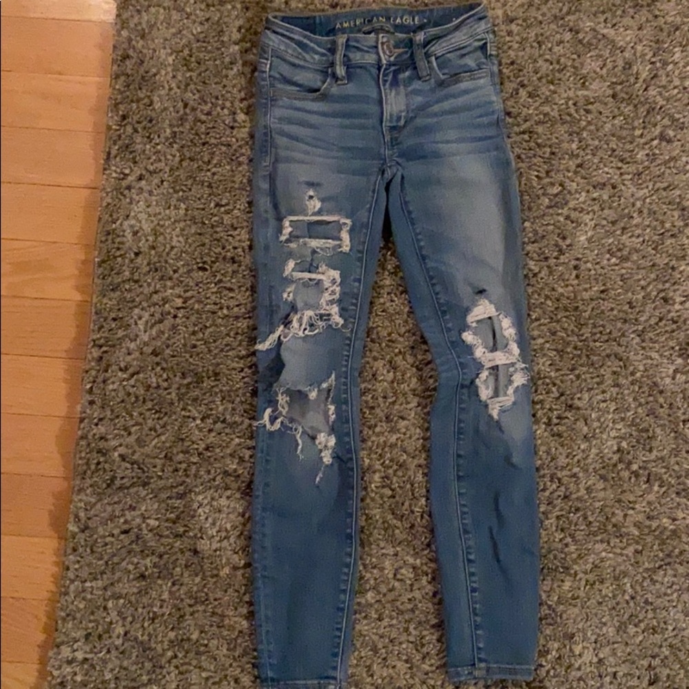 ripped medium wash jeans